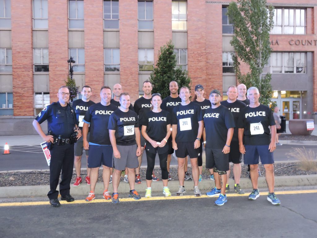 Run With the Cops Fundraiser for Special Olympics Held in Downtown